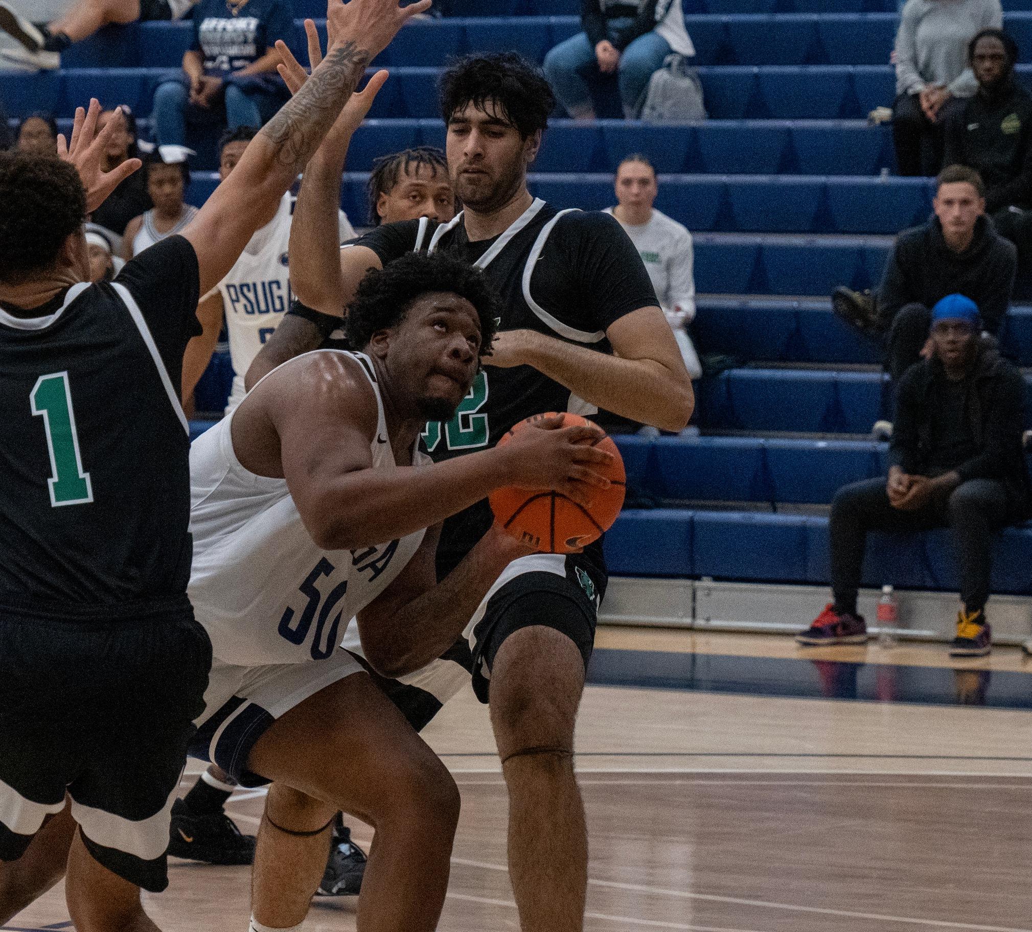Men's Basketball Comes From 11 Down at Half to Win Important PSUAC Game